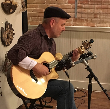 Tim Hillwood playing at event